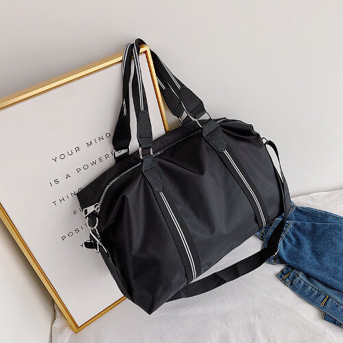 Singapore Travel Bag gift with purchase idea for liqour purchase - side view Singapore Travel Bag gift with purchase idea for liqour purchase side view 1 1
